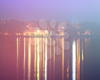 Soft reflections of river night illumination backdrop