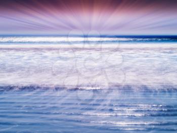 Dramatic sun rays over the tidal waves of ocean backdrop hd