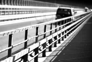 Black and white car on Norway bridge perspective background hd