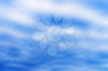 Horizontal high altitude blue blurred cloudscape background
