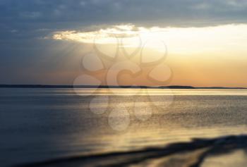 Sunset rays over the ocean with boat trace background hd