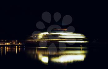 Horizontal vivid rotating ship motion blur night abstraction background backdrop