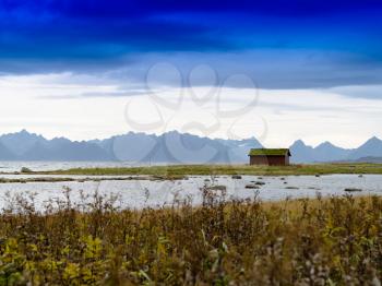 Horizontal vivid Norway cabin fjord landscape background backdrop