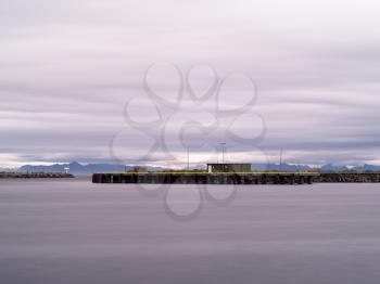 Horizontal dramatic Norway northern pier quay cloudscape background backdrop