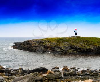 Horizontal vivid Norway right aligned lighthouse  on island landscape background backdrop