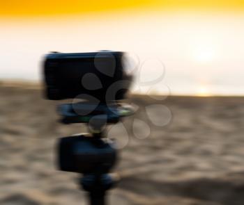 Horizontal vivid camera on tripod abstraction background backdrop