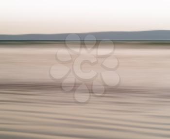 Horizontal vibrant ocean milk motion blur abstraction background backdrop