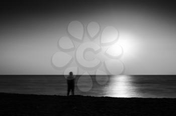 Horizontal vivid black and white meeting ocean sunset lonely man abstraction landscape background backdrop  
