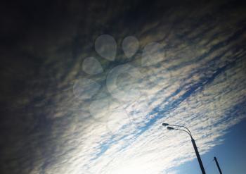 Dramatic cloudscape with city lamp post background hd