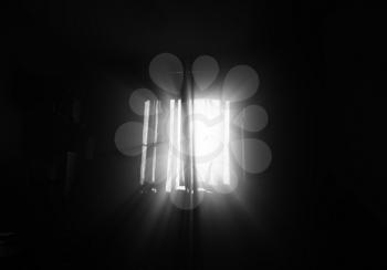 Dramatic light rays from room window background