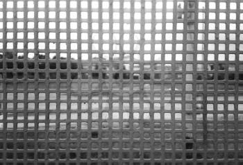 Horizontal black and white fence grid background