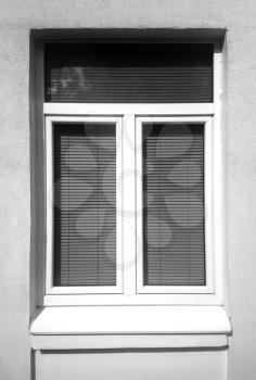 Vertical black and white closed window background