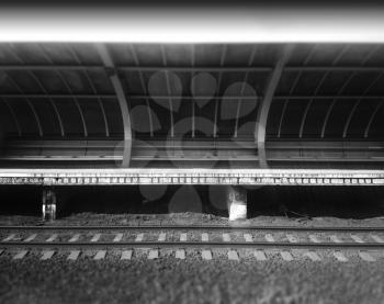Empty black and white railroad station city background