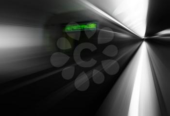 Diagonal motion blur metro train with green board background
