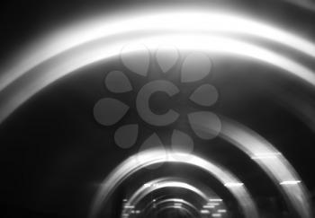 Black and white curved motion blur arc background