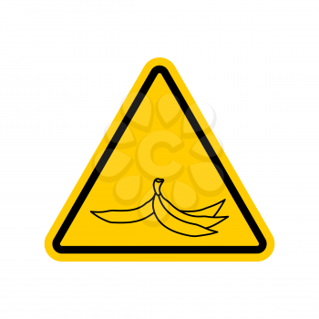 Attention garbage. Peel from banana on yellow triangle. Road sign Caution trash

