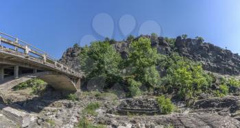 Venetikos river with green water and  beautiful rock formations near Meteora in Greece