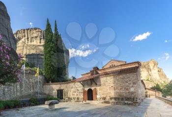 Panoramic view of the Assumption of Virgin Mary byzantine church in Meteora, Kalambaka town in Greece, on a sunny summer day