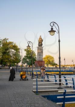 Kherson, Ukraine - 04.27.2019. Monument to the first shipbuilders in Kherson in the spring evening