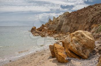 Natural Shell rocks and stones  on the coast of Odessa in Ukraine on a sunny spring day