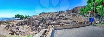 Pergamon, Turkey -07.22.2019. The main entrance to the Ancient Greek city Pergamon in Turkey on a sunny summer day. Big size panoramic view