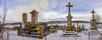 Mykulyntsi, Ukraine 01.06.2020. Grave of the Reyiv family and the Polish cemetery in Mykulyntsi village, Ternopil region of Ukraine, on a winter day