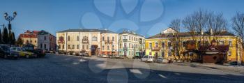Kamianets-Podilskyi, Ukraine 01.07.2020. Historical Buildings on the old street of Kamianets-Podilskyi old town quarter on a sunny winter morning