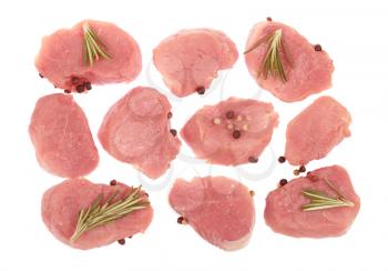 Raw pork  tenderloin slices isolated on white background