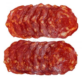 Slices of chorizo sausage isolated on white background