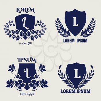 Vintage heraldic floral shields vector icons. Shields with leaves labels design