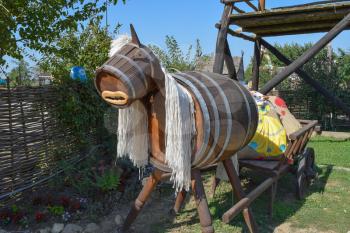 Toy horse from the barrels. Fun creative improvised items.