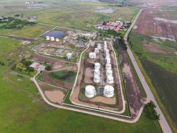 Aerial view of oil storage tanks. Industrial facility for the storage and separation of oil.