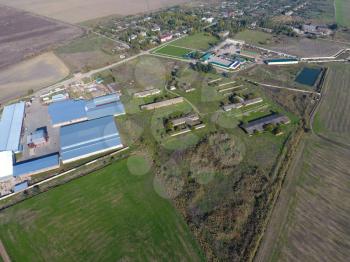 Top view of the village with houses and hangars for the storage of grain.