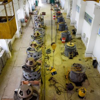 Engines of water pumps at a water pumping station. Pumping irrigation system of rice fields. Room control and maintenance of pump electric motors.