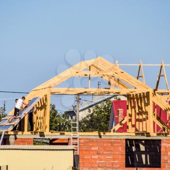 village Poltavskaya, Russia - August 20, 2016: Roof of the house under construction. Construction of a private house.