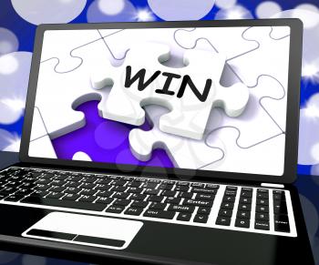 Win Puzzle On Laptop Shows Victory And 1st Prize