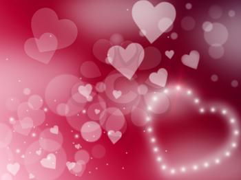 Hearts Glow Indicating Valentine Day And Illuminated