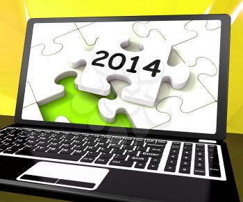 Two Thousand And Fourteen On Laptop Showing New Years Resolution 2014