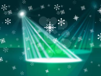 Spotlight Snowflake Showing Merry Xmas And Illuminated