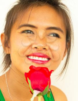 Smiling Girl With Rose Showing Joyful And Healthy