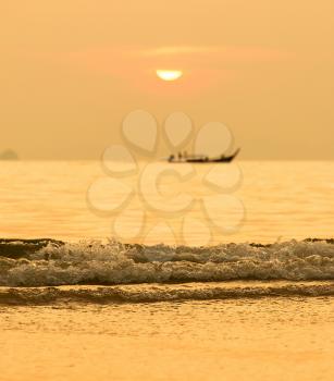 Sunset In Thailand With Sea And Longtail Boat