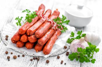 Sausages on white background