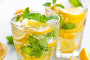 Lemon mojito cocktail with fresh mint, cold refreshing summer drink or beverage with ice