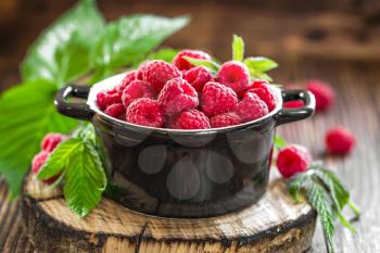 Fresh raspberry with leaves
