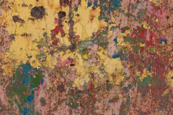 Rusty, with multi-colored peeling paint, old, vintage background.red, blue, yellow, green paint