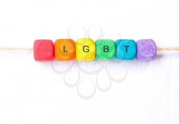Word LGBT rainbow of colors on the dice.Concept  LGBT.Rainbow flag.