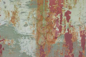 Rusty old with peeling green paint, vintage background