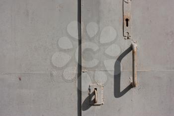 Rusty, with gray paint, old, vintage door handle.Rusty background.