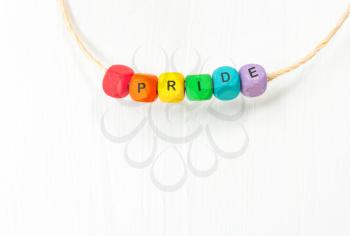 Word pride  rainbow colors on cubes.Concept  LGBT.Rainbow flag.