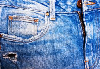 Blue jeans closeup , texture of denim